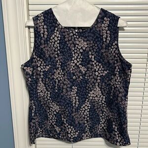 Medium sleeveless blue/gray print dressy blouse.
